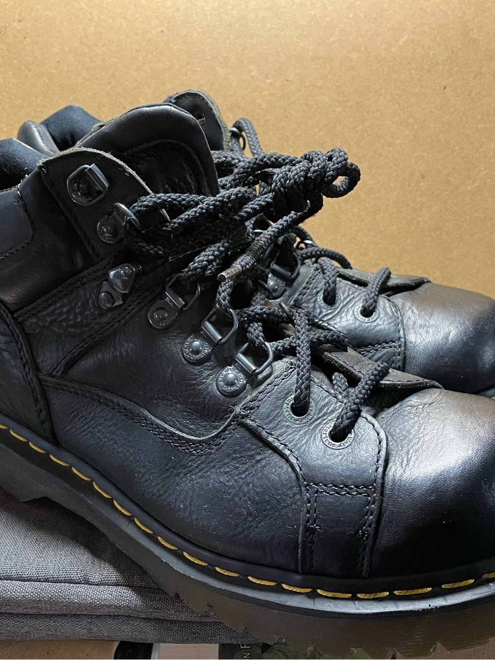 Dr. Martens Black Leather Lace-Up Hiking-Style Boots with Yellow Stitching